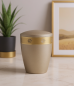 Preview: Pet urn in matte sandy beige with a golden accent ring, elegantly displayed in a home setting for a dignified remembrance of a beloved pet (dog/cat).